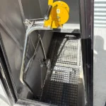 DryLoo crank mechanism for the lift inside the access door of the colourbond flue